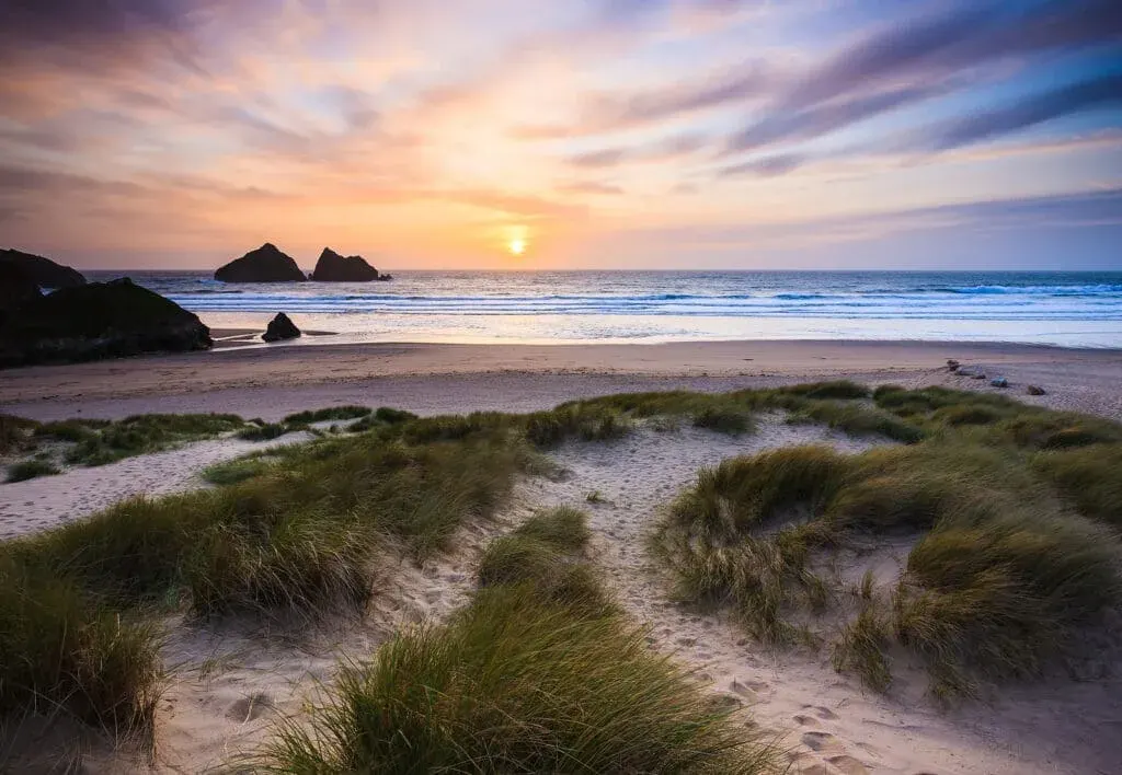 Holywell Bay Beach at dusk on a summer’s day