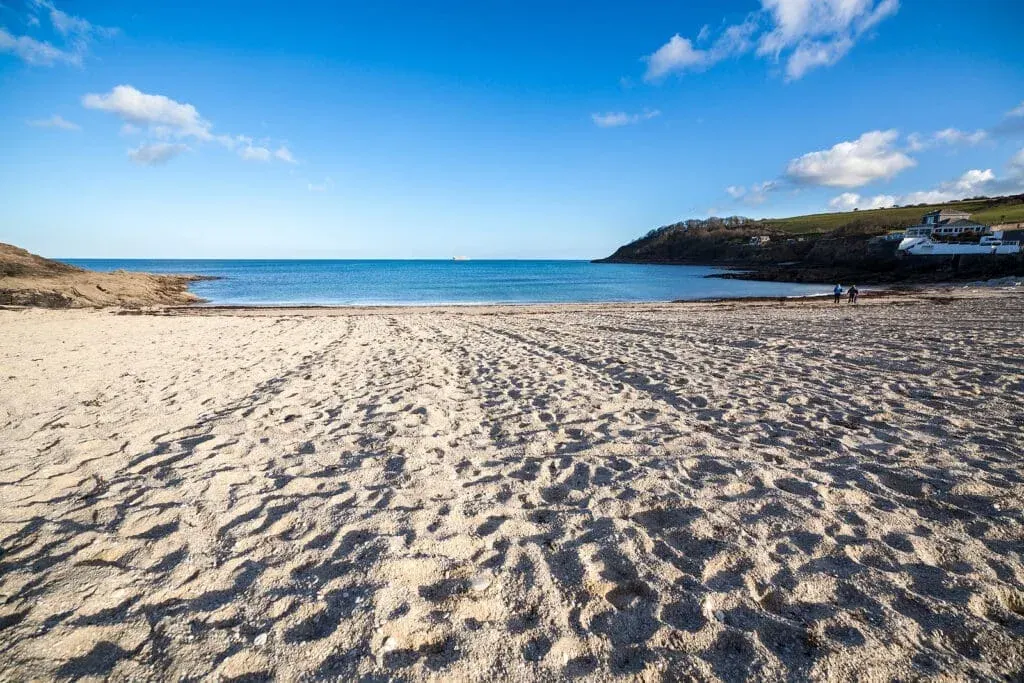 Sun and sand on a summer’s day at Swanpool Beach, Falmouth, Cornwall