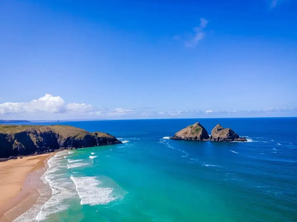 An aerial view of Holywell beach (near Newquay) in summer