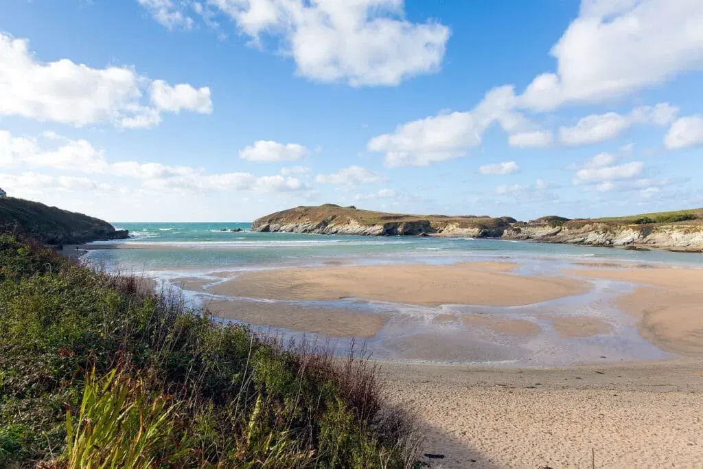 Low tide on a spring afternoon at Porth Beach, Newquay, Cornwall