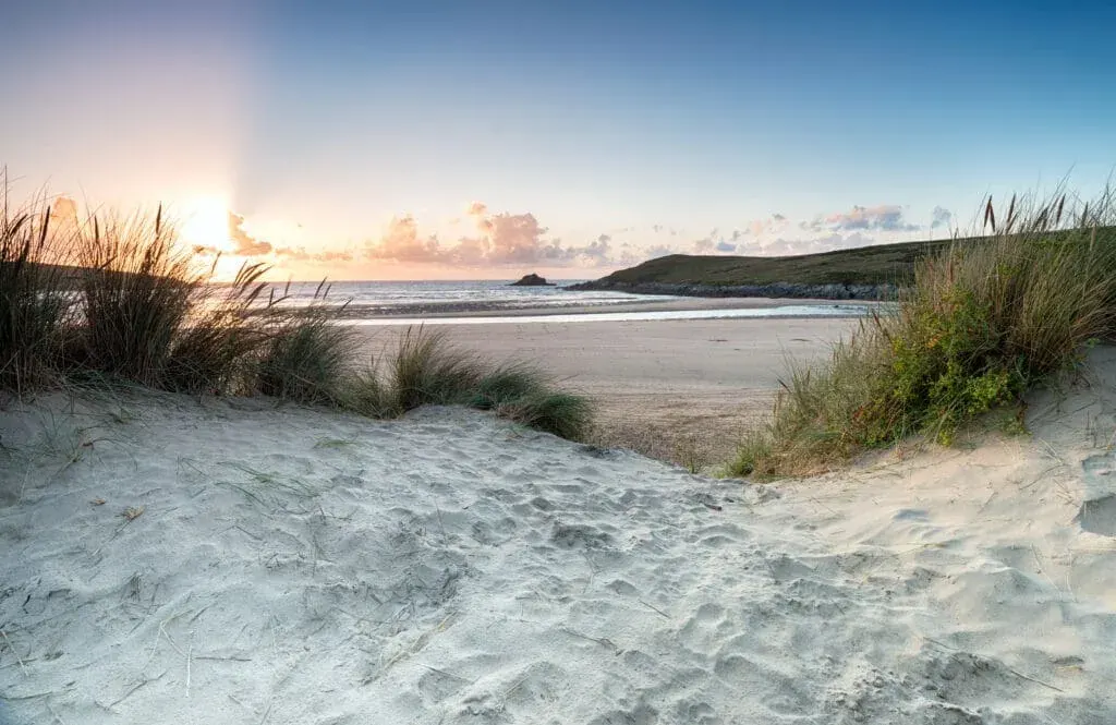Sunset through the sand dunes at Crantock Beach near Newquay, Cornwall