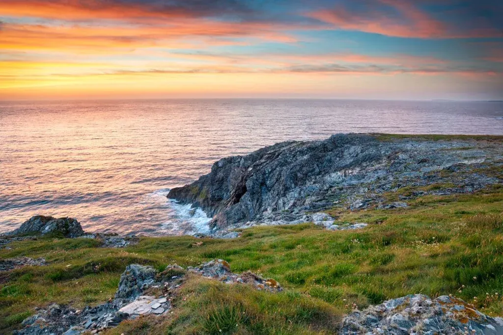 Sunset on the cliffs at West Pentire above Crantock, near Newquay, Cornwall